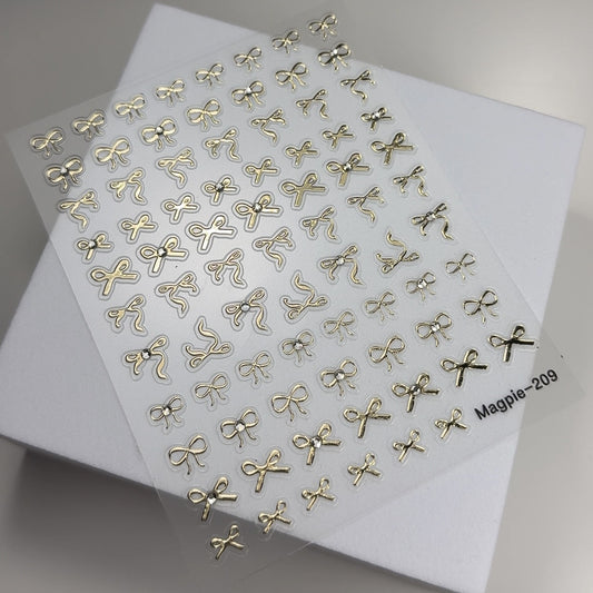 Sticker 209 - gold bows